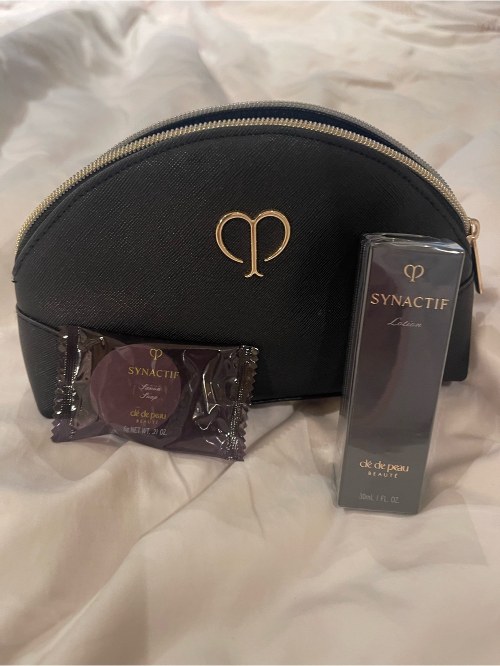 Cle de Peau Black and Gold Travel Cosmetic Pouch with Synactif New
